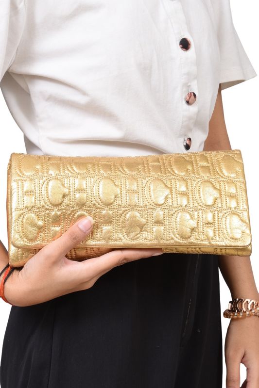 Carolina Herrera Golden Monogram Embossed Clutch