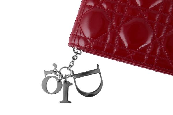 CHRISTIAN DIOR PATENT LEATHER CHARMS CLUTCH