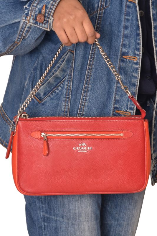 Coach Nolita Polished Pebble Leather Sling Bag