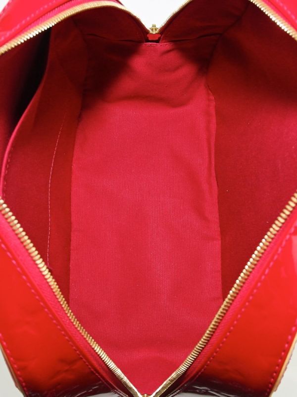 LOUIS VUITTON SUMMIT DRIVE MONOGRAM RED