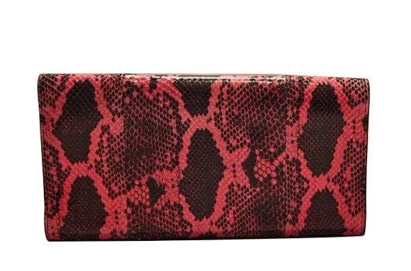 YSL CASSANDRE PYTHON CLUTCH