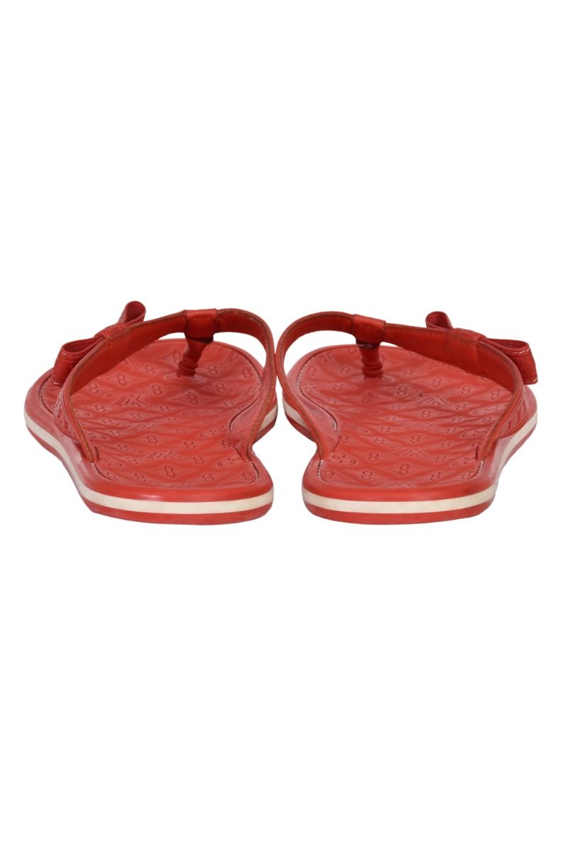 Louis vuitton red bottom flip flops online