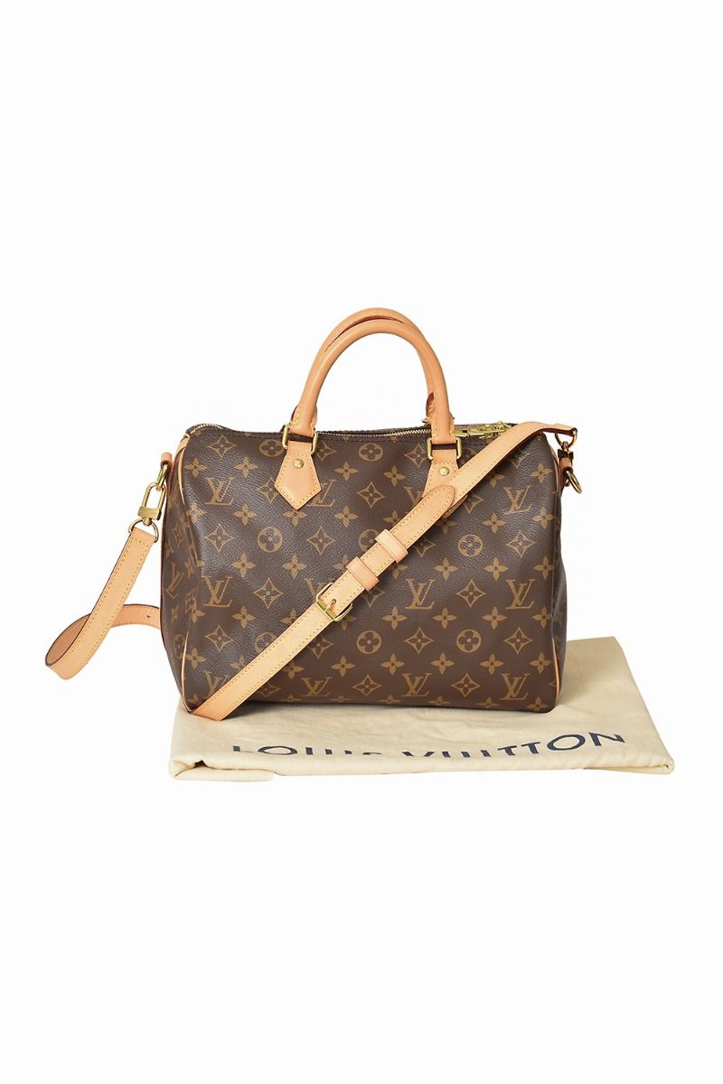 Poshbag Boutique - New-in! This Louis Vuitton Speedy Bandoulière 30 in Monogram  Giant Reverse Canvas is in excellent condition and includes its original  box, dust bag, shoulder strap, lock and keys •